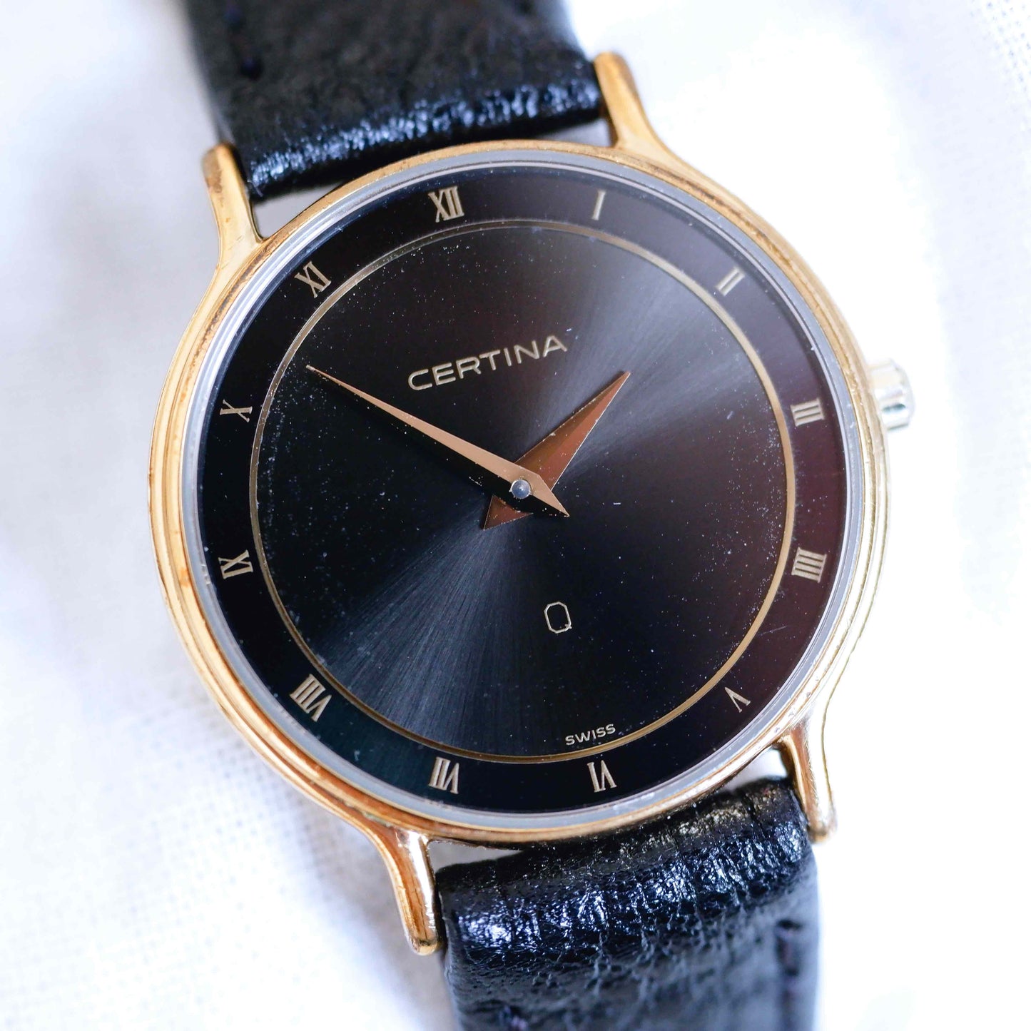 Certina Vintage Ladies Watch: 90s Gold, Black Dial and Roman Numerals | Slight Left Side