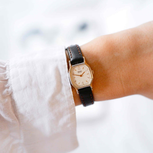 Seiko Vintage Watch: Ladies 80s Golden Two Tone Rectangular with White Dial