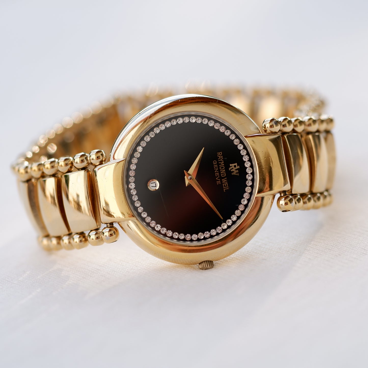 Raymond Weil Vintage Ladies Watch: 90s Golden with Black Diamond-Set Dial