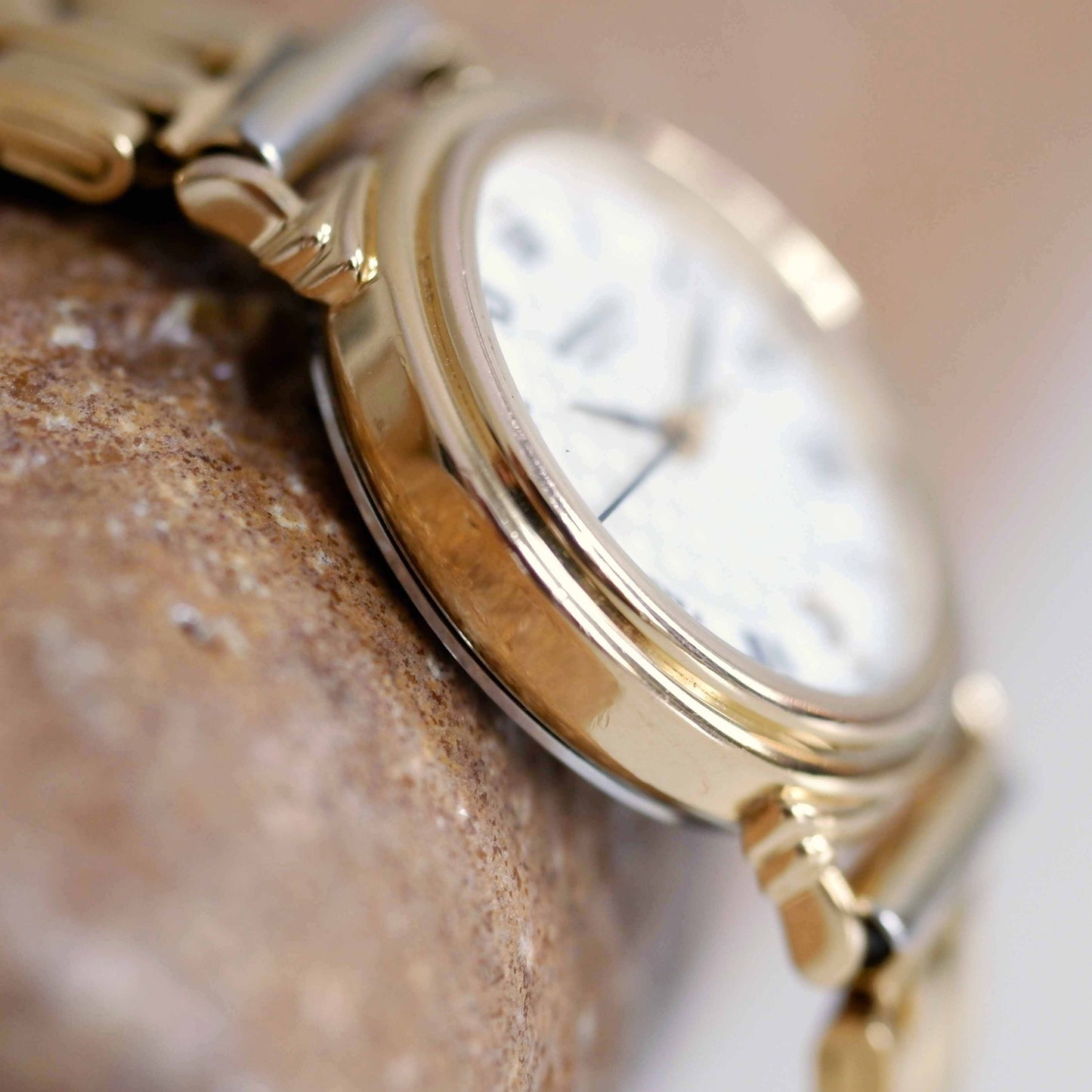 Raymond Weil Vintage Ladies Watch: 90s Golden Style with Roman Numerals | Left Side View