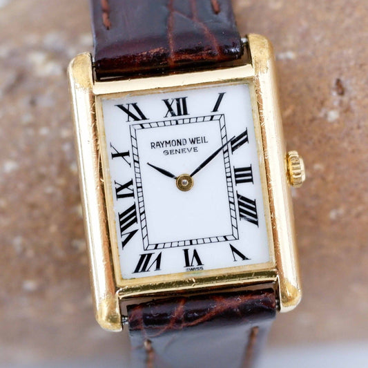 Raymond Weil Vintage Ladies Watch: 90s Golden Rectangular Style with Roman Numerals | First Front Side