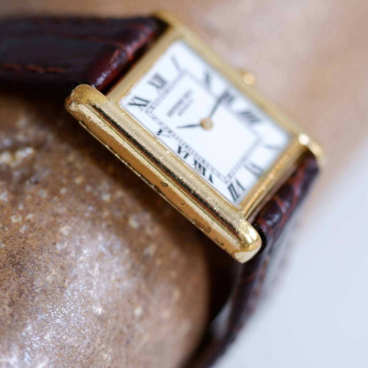 Raymond Weil Vintage Ladies Watch: 90s Golden Rectangular Style with Roman Numerals | Side View Left