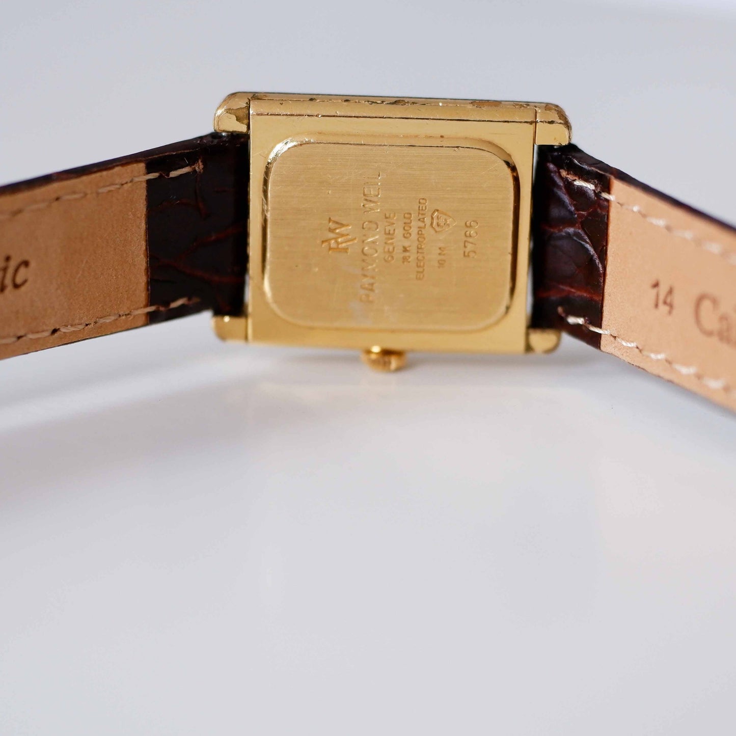 Raymond Weil Vintage Ladies Watch: 90s Golden Rectangular Style with Roman Numerals | Back Side