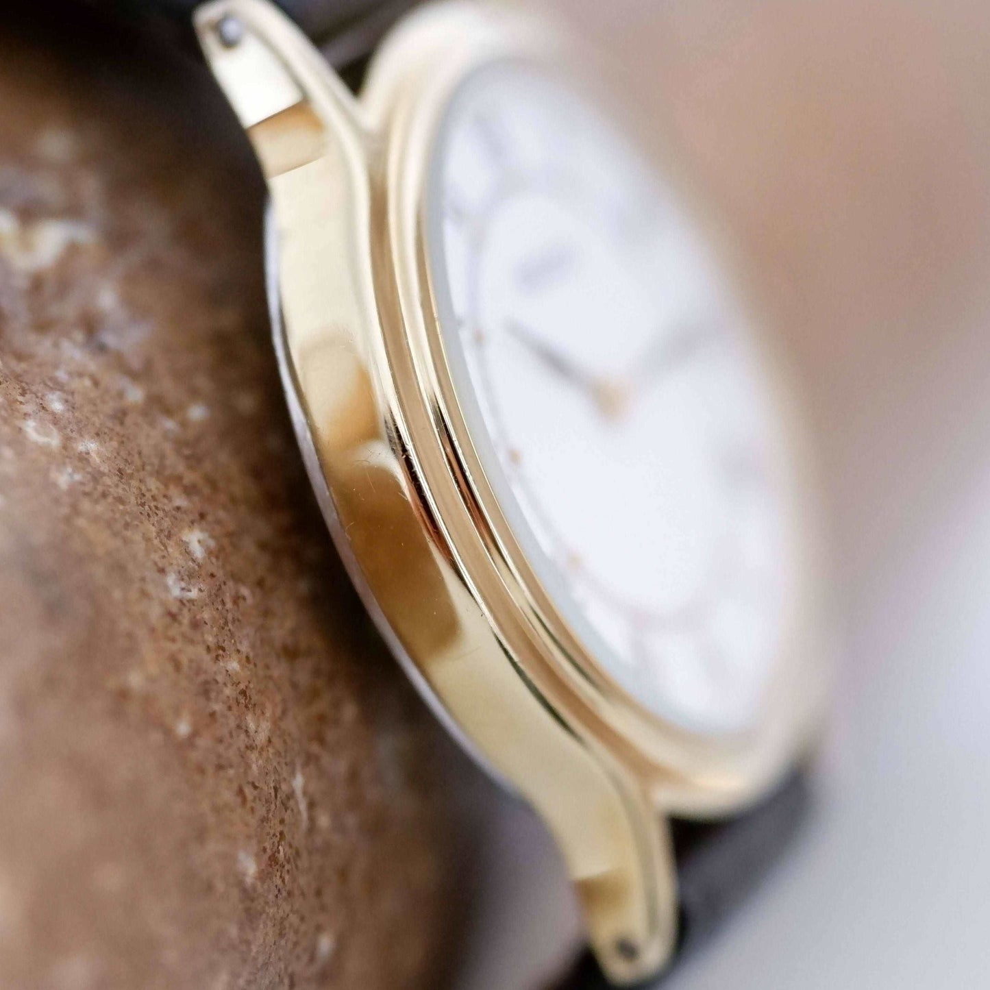 Seiko Vintage Ladies Watch: 90s Gold with Elegant Roman Numerals, Side View Left