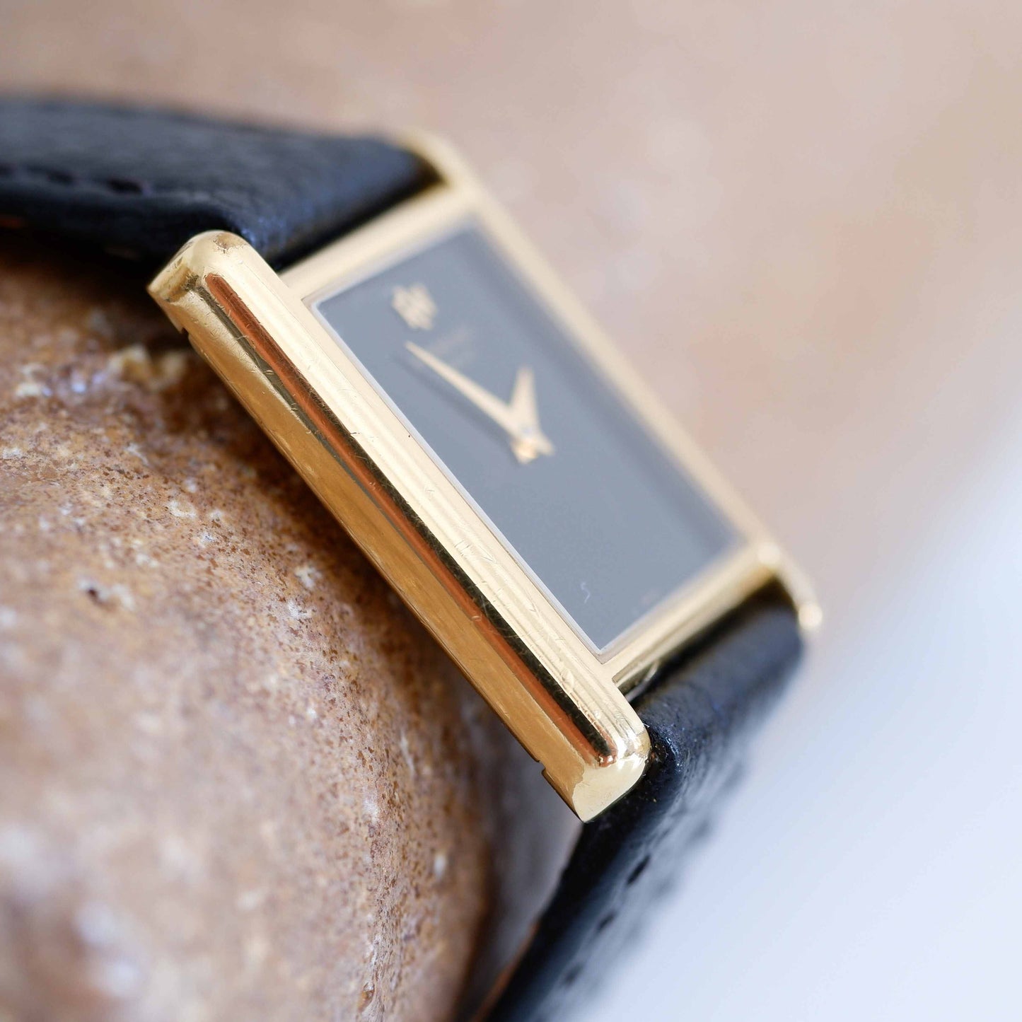 Raymond Weil Vintage Ladies Watch: 90s Golden Rectangular Style with Black Dial | Side View Left