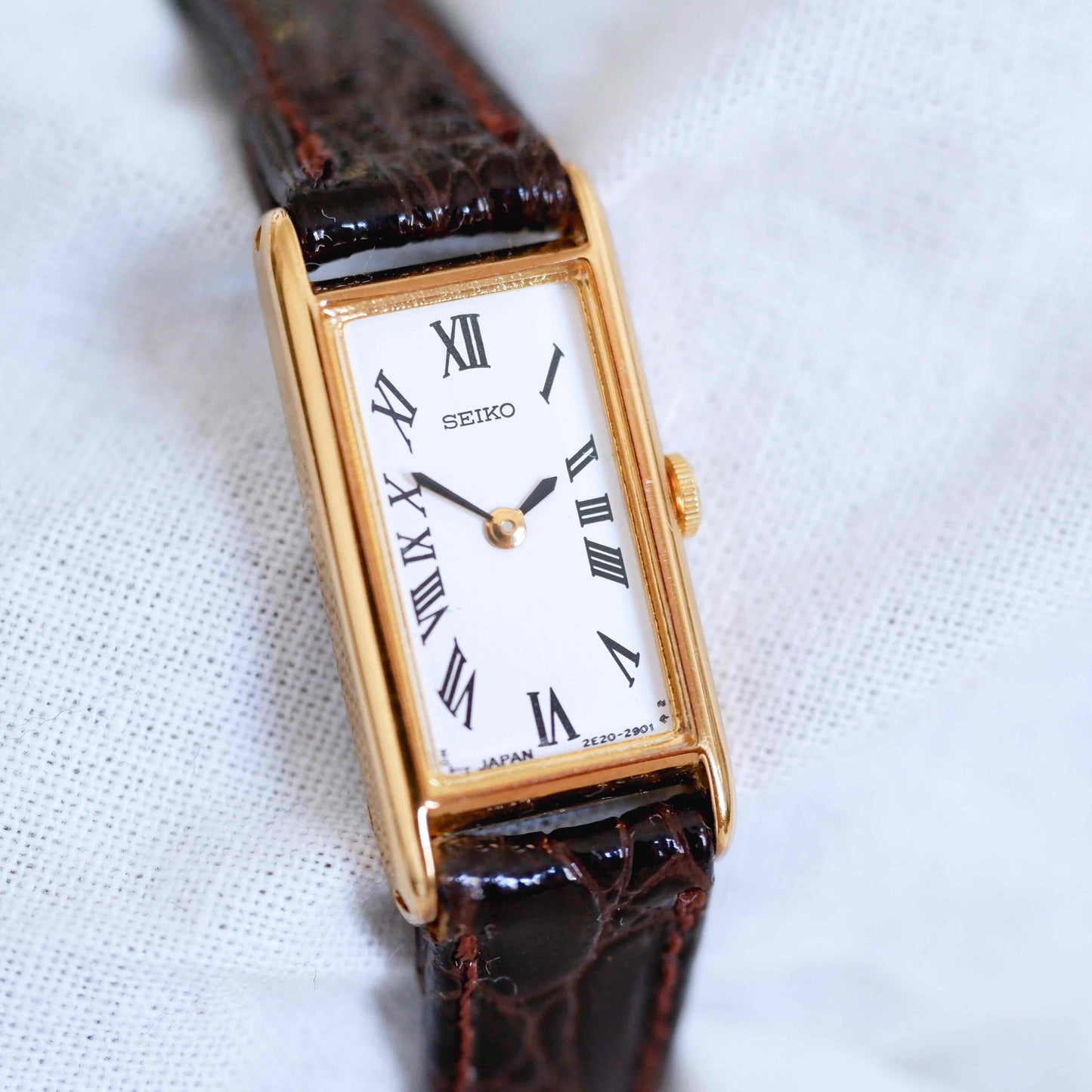 Seiko Vintage Watch: Ladies 80s Gold Rectangular with White Roman Dial