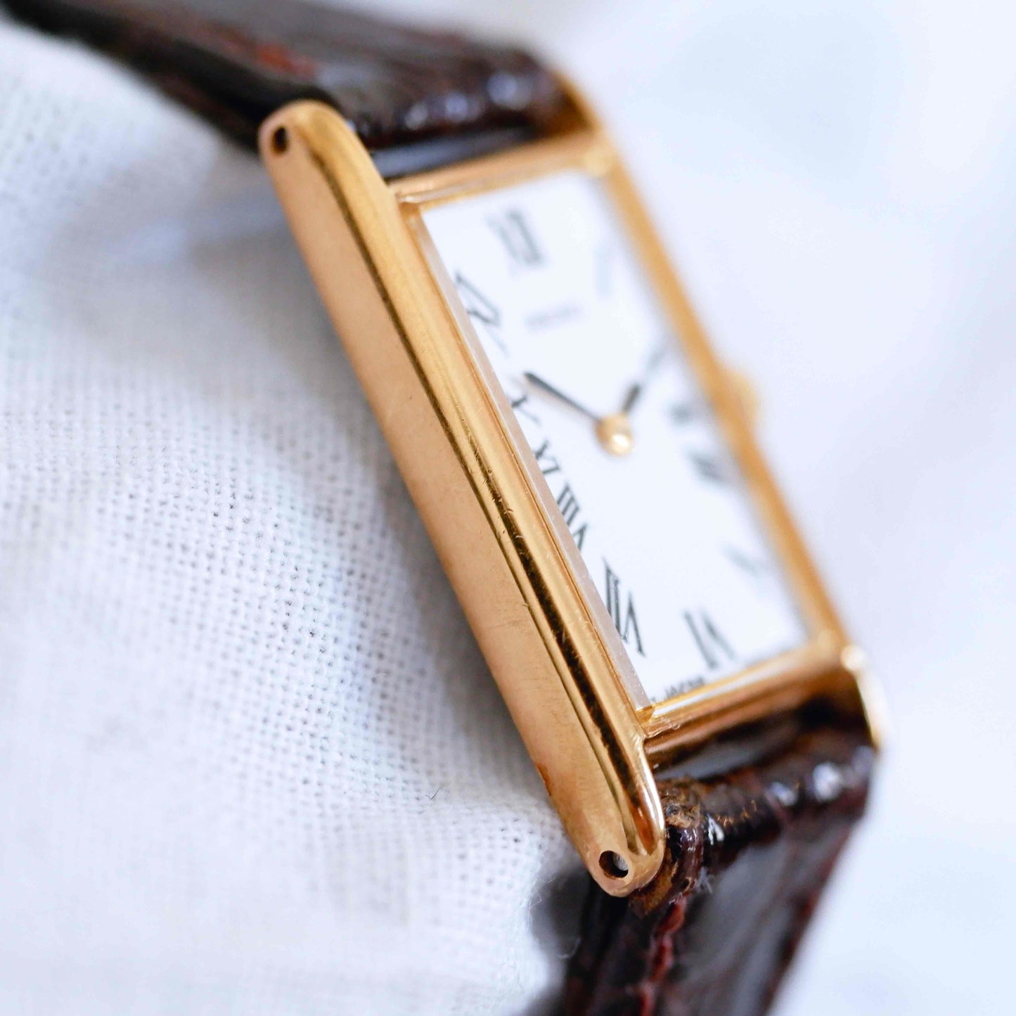 Seiko Vintage Watch: Ladies 80s Gold Rectangular with White Roman Dial