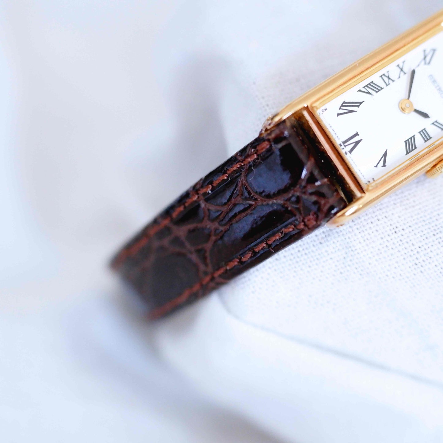 Seiko Vintage Watch: Ladies 80s Gold Rectangular with White Roman Dial