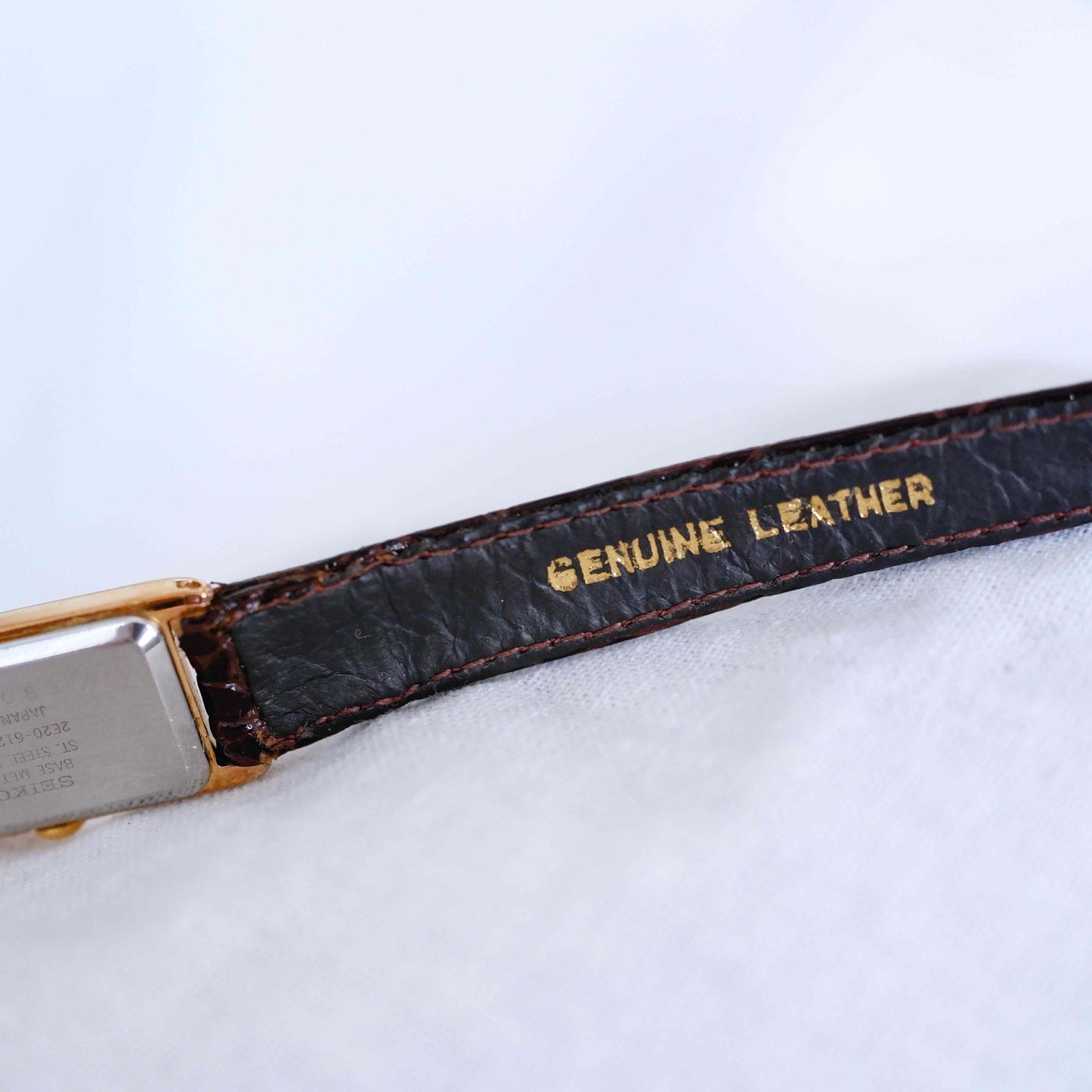 Seiko Vintage Watch: Ladies 80s Gold Rectangular with White Roman Dial