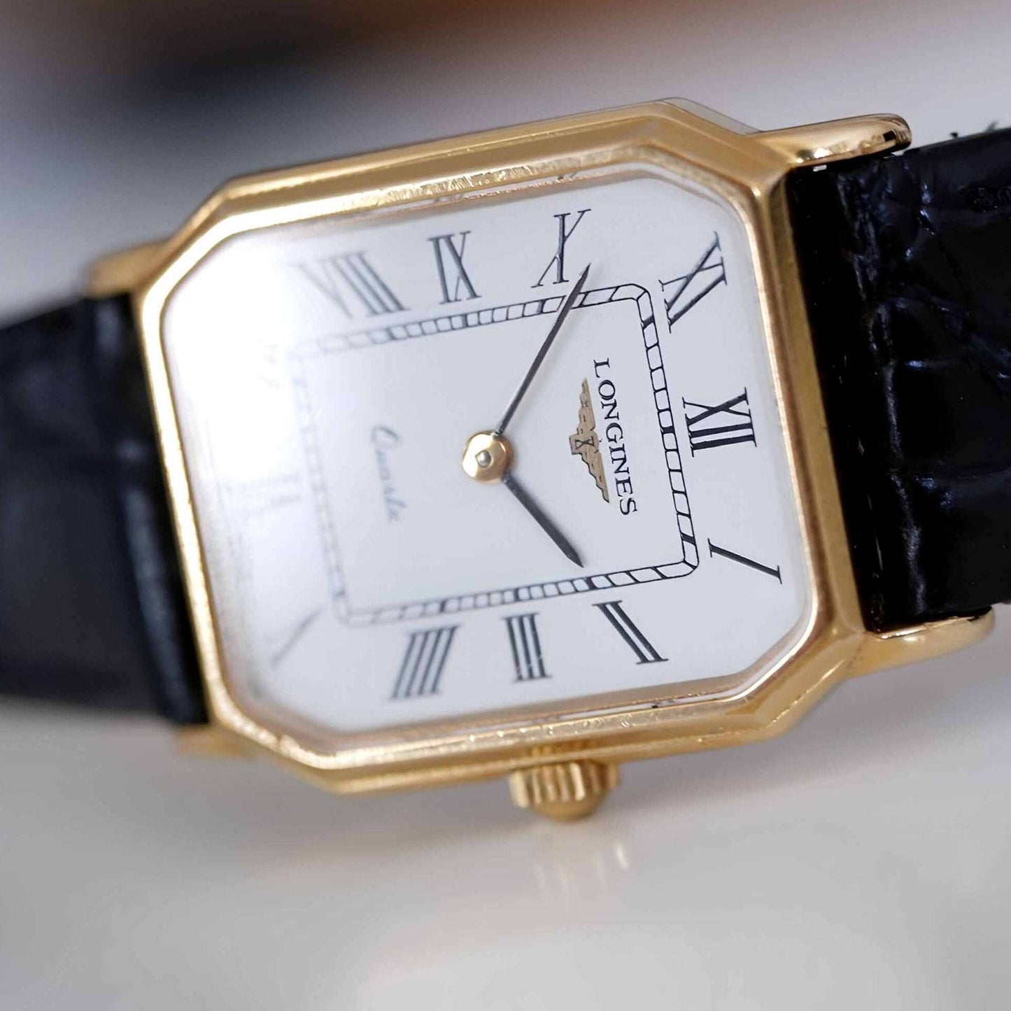 Longines Vintage Ladies Watch: 90s Golden, Rectangular with Roman Numerals | Third Front Side