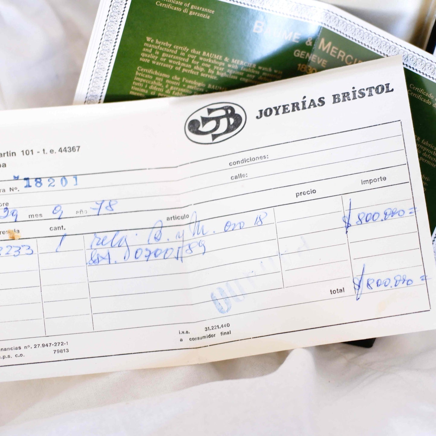 Baume & Mercier Ellipse: 18k Gold Vintage Ladies Watch Black Dial with Blue Sapphire Crown Full Set Near NOS