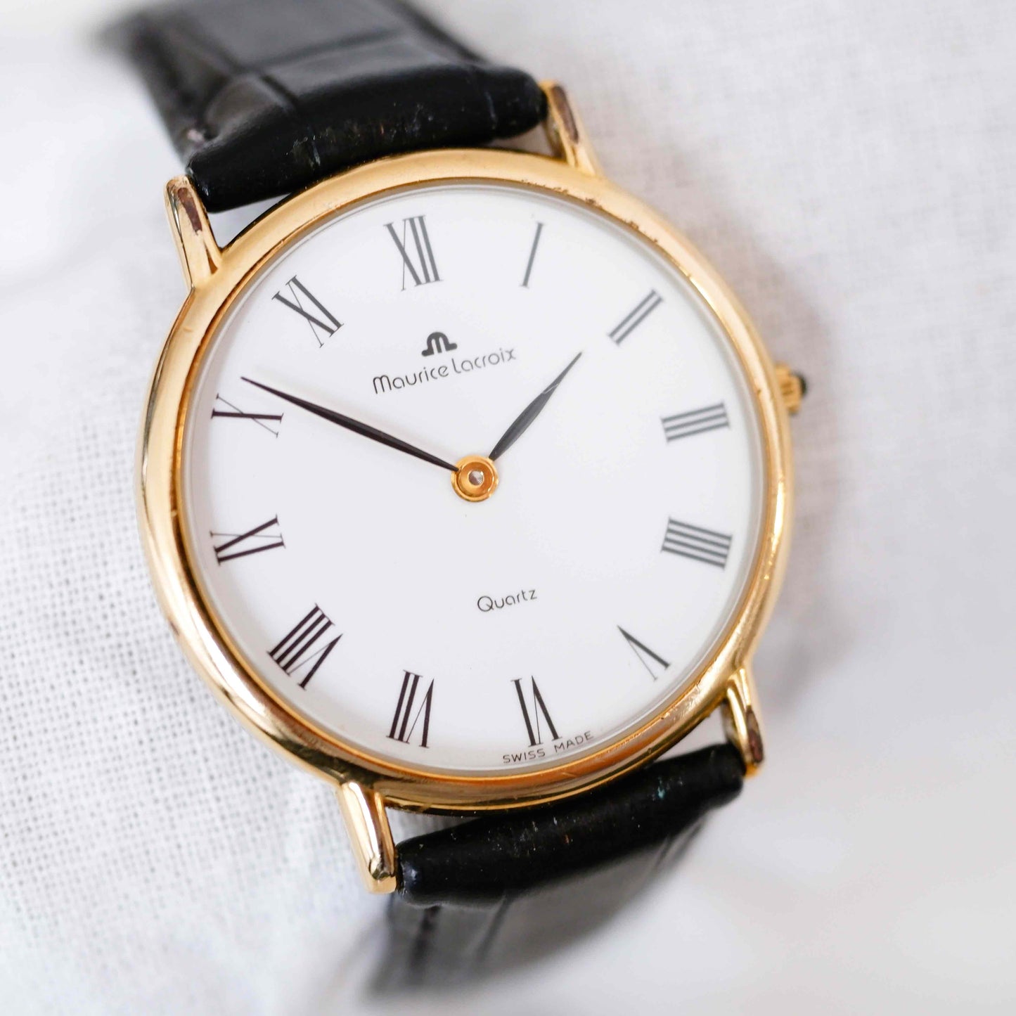 Maurice Lacroix Vintage Ladies Watch: 90s Gold Two Hand with Iconic Roman Numerals | Slight Left Side