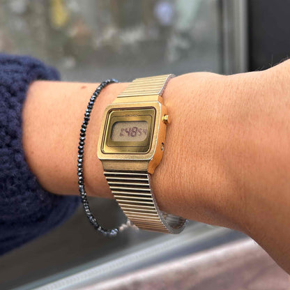 Seiko Digital Watch: Vintage Ladies 80s Golden with Digital Display