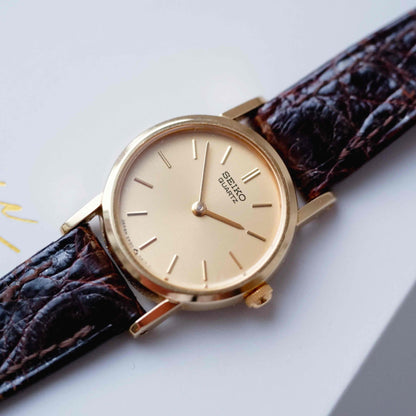 Seiko Cocktail Watch: Vintage Ladies 80s Gold with Champagne Dial