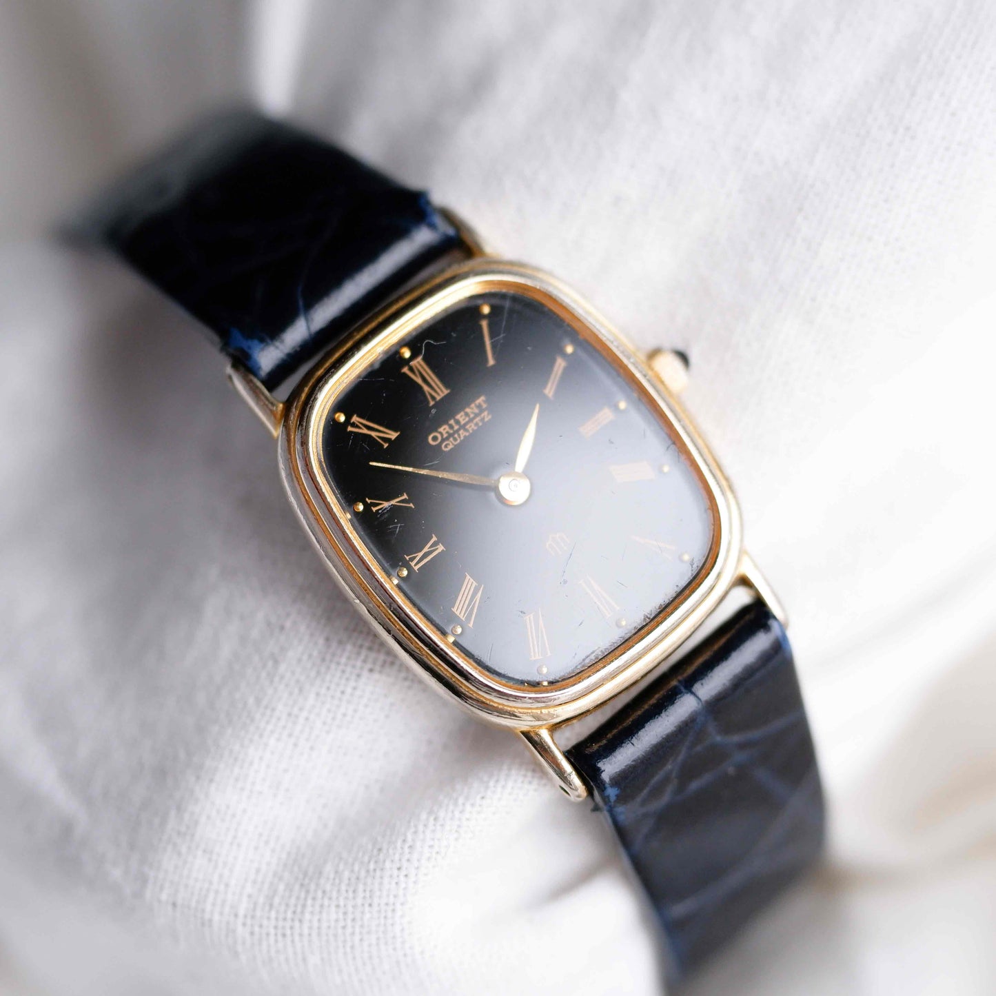 Orient Tank Watch: Ladies 80s Golden Classic Black Roman Dial