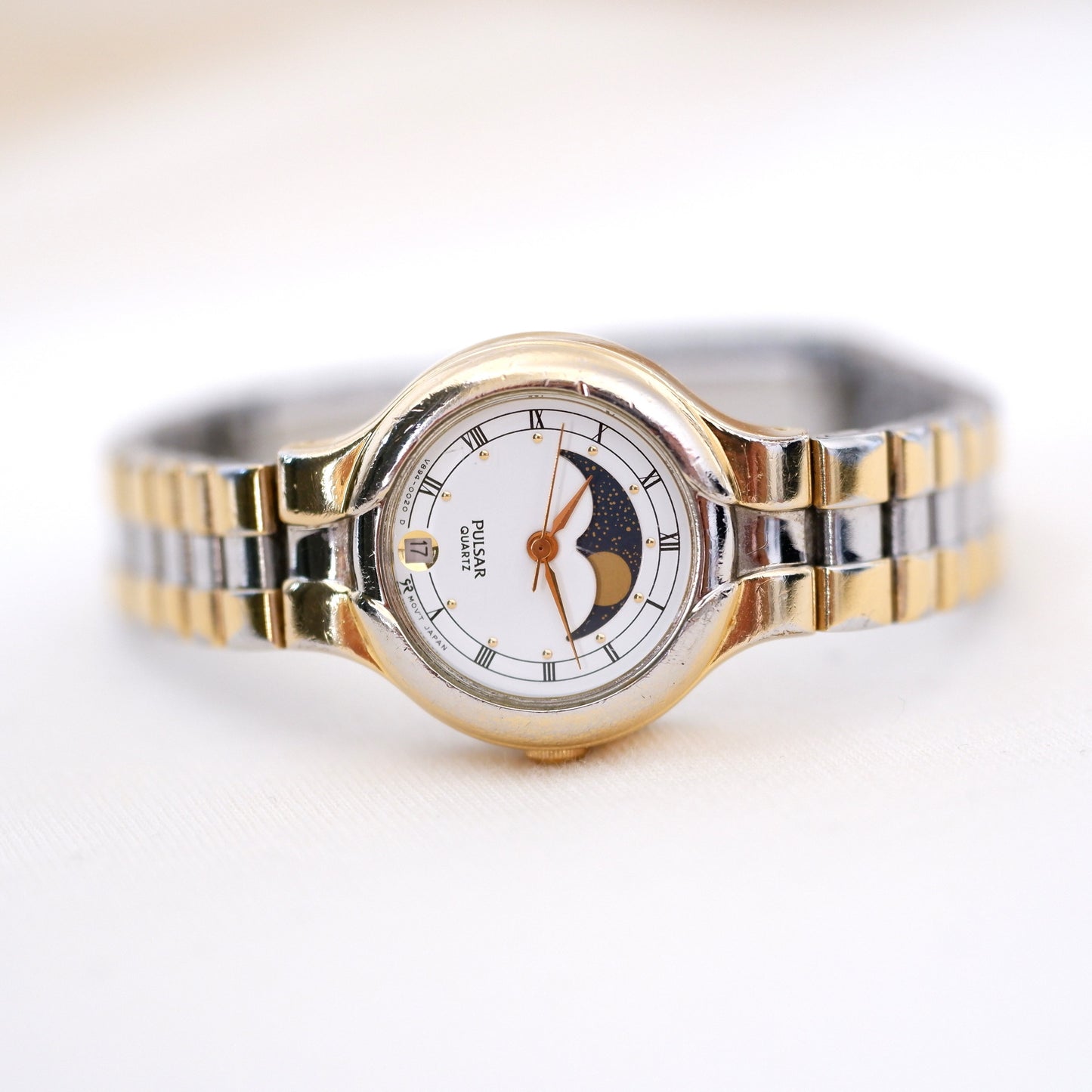 Pulsar Vintage Watch: Ladies 80s Gold Roman Numerals Moon Phase Style