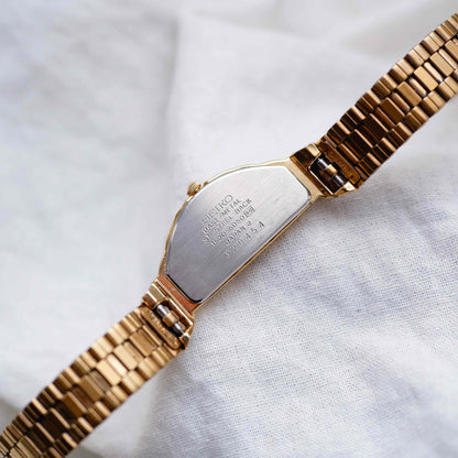 Seiko Half Moon: Vintage Cocktail Watch 90s Ladies Golden Dainty with Champagne Dial