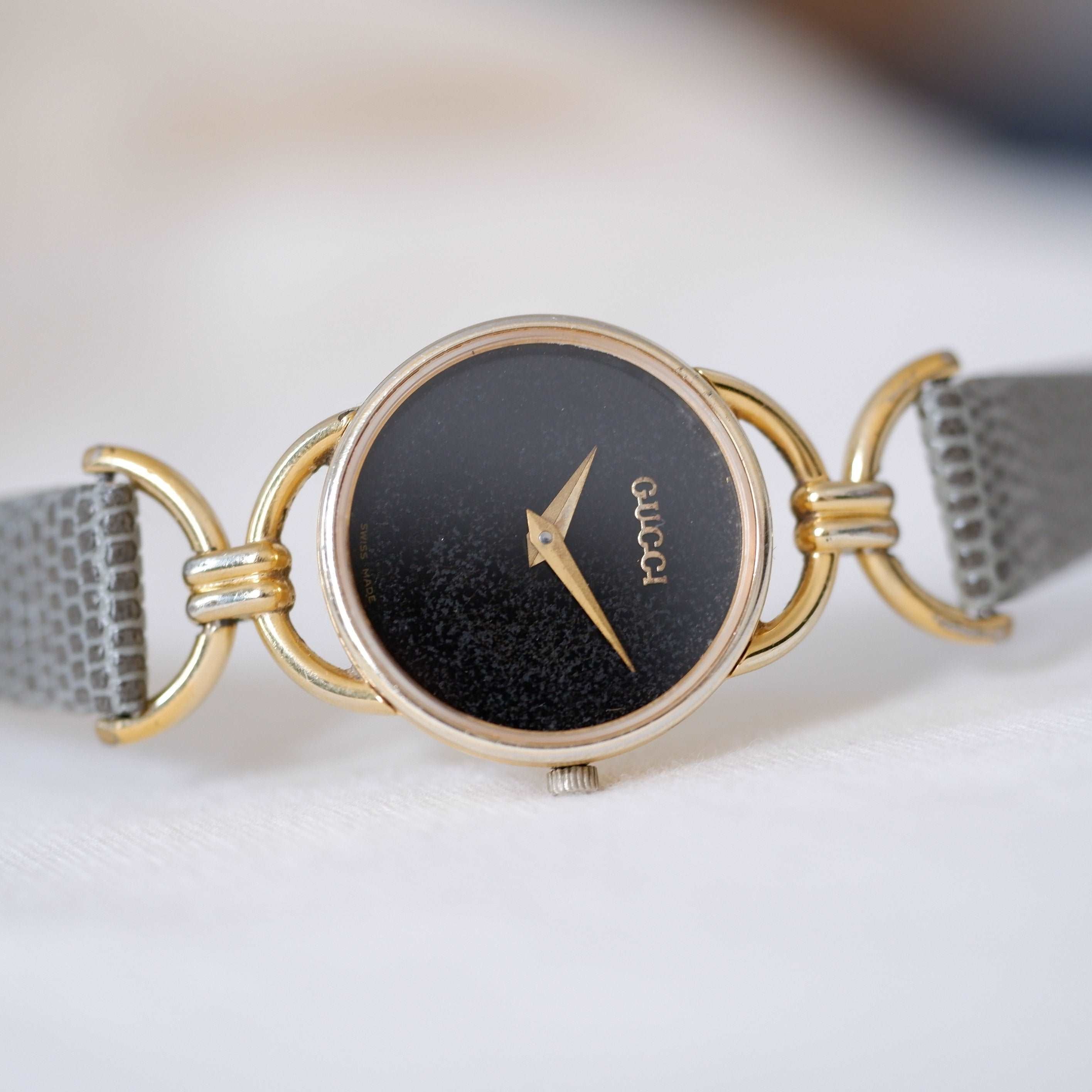 Gucci 6000.2.l Watch: Vintage Ladies 90s Gold and Tropical Black Dial