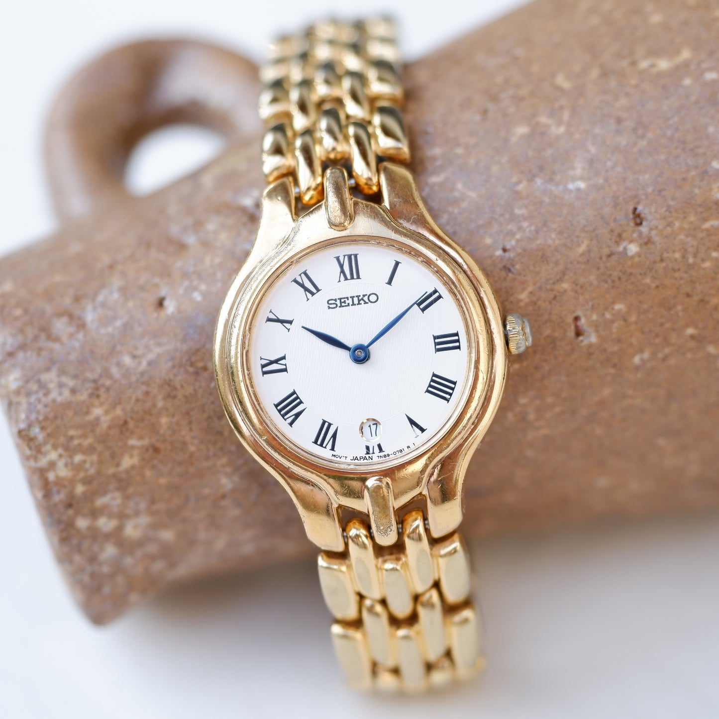 Seiko Vintage Watch: Ladies 80s Golden Blued Hands White Roman Dial