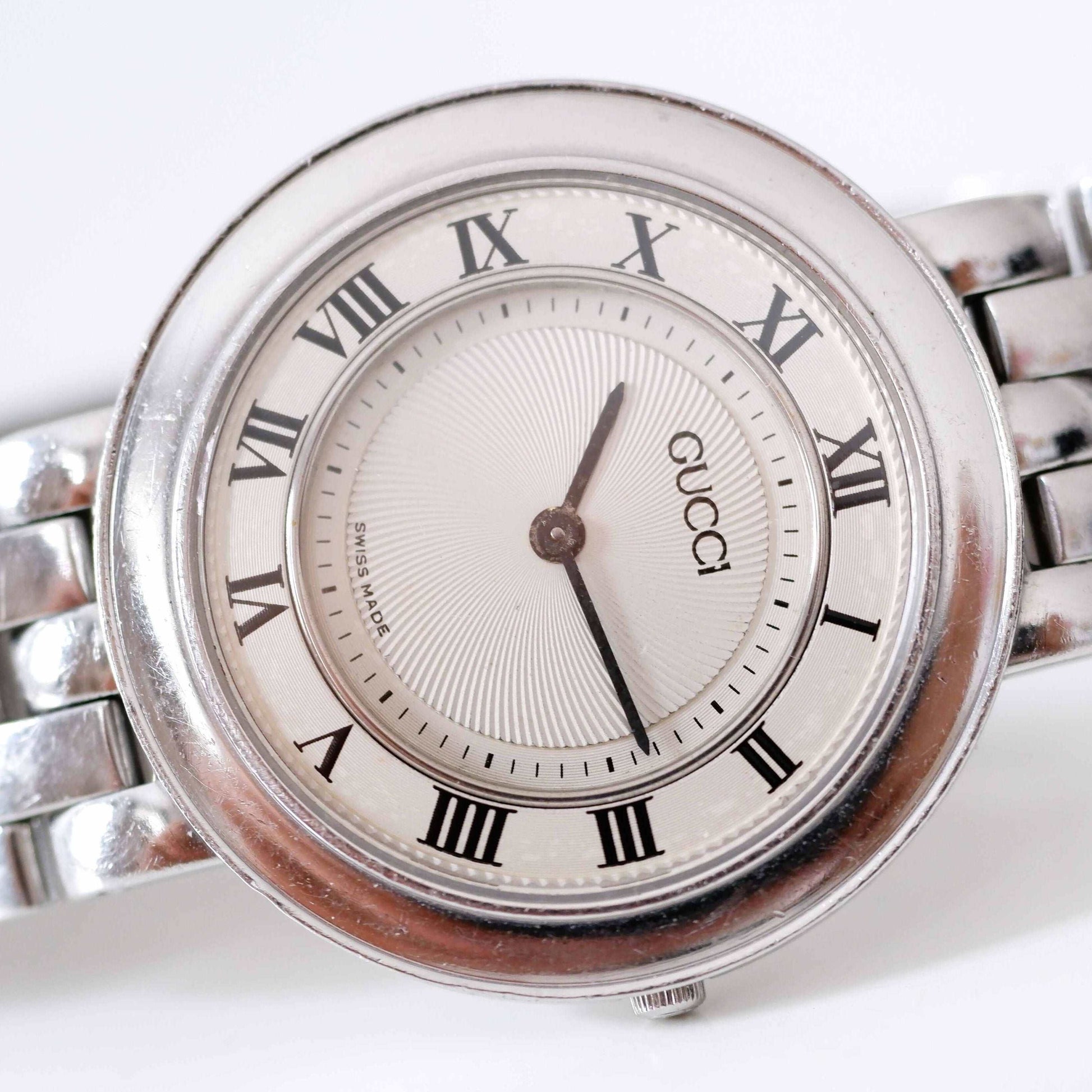 Gucci 546m Vintage Ladies Watch: 90s Silver with Classic Roman Numerals, Third Front Side