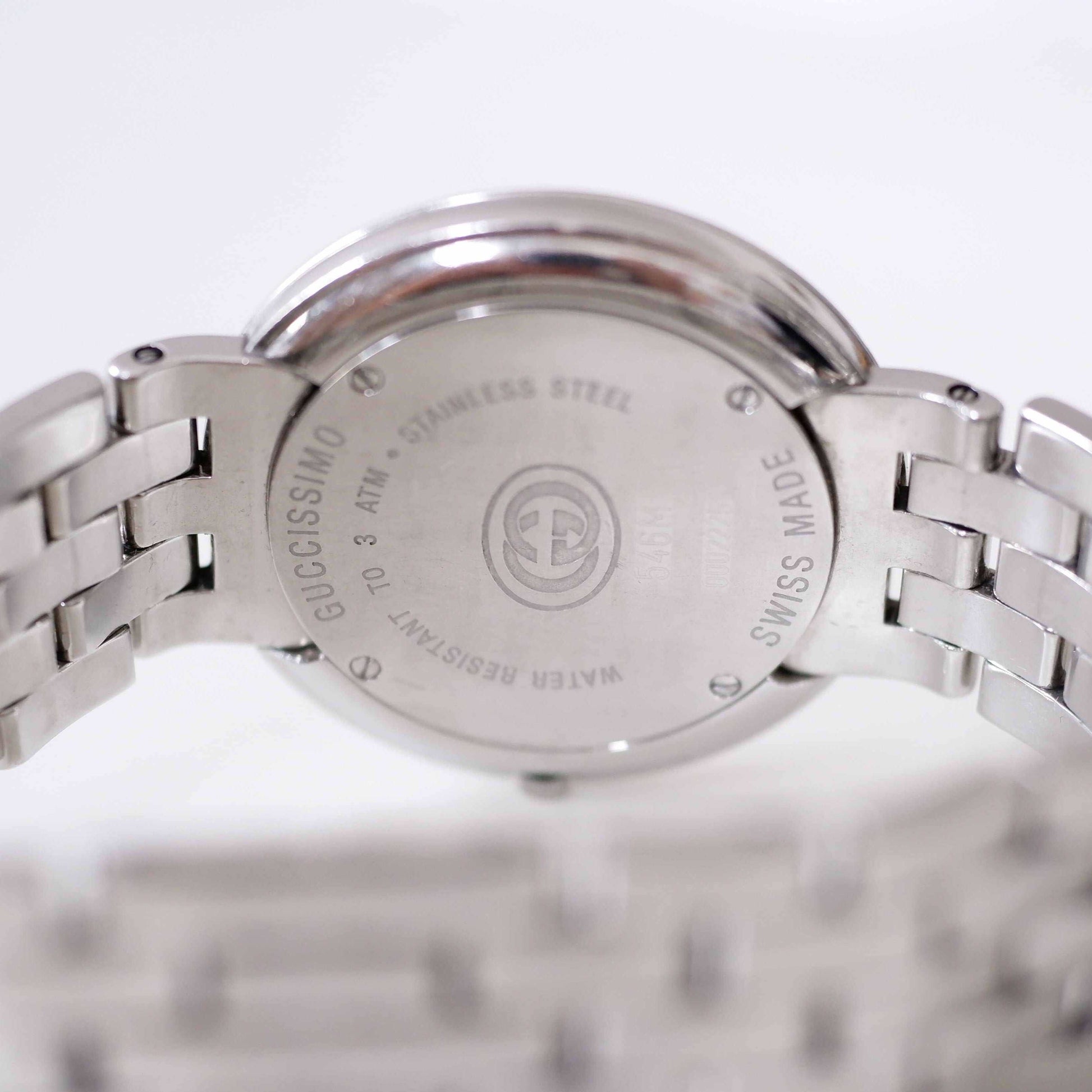 Gucci 546m Vintage Ladies Watch: 90s Silver with Classic Roman Numerals, Back Side