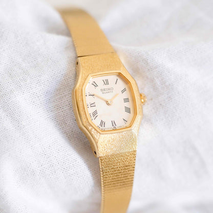 Seiko Cocktail Watch: Vintage Ladies 80s Golden Dainty with Champagne Dial