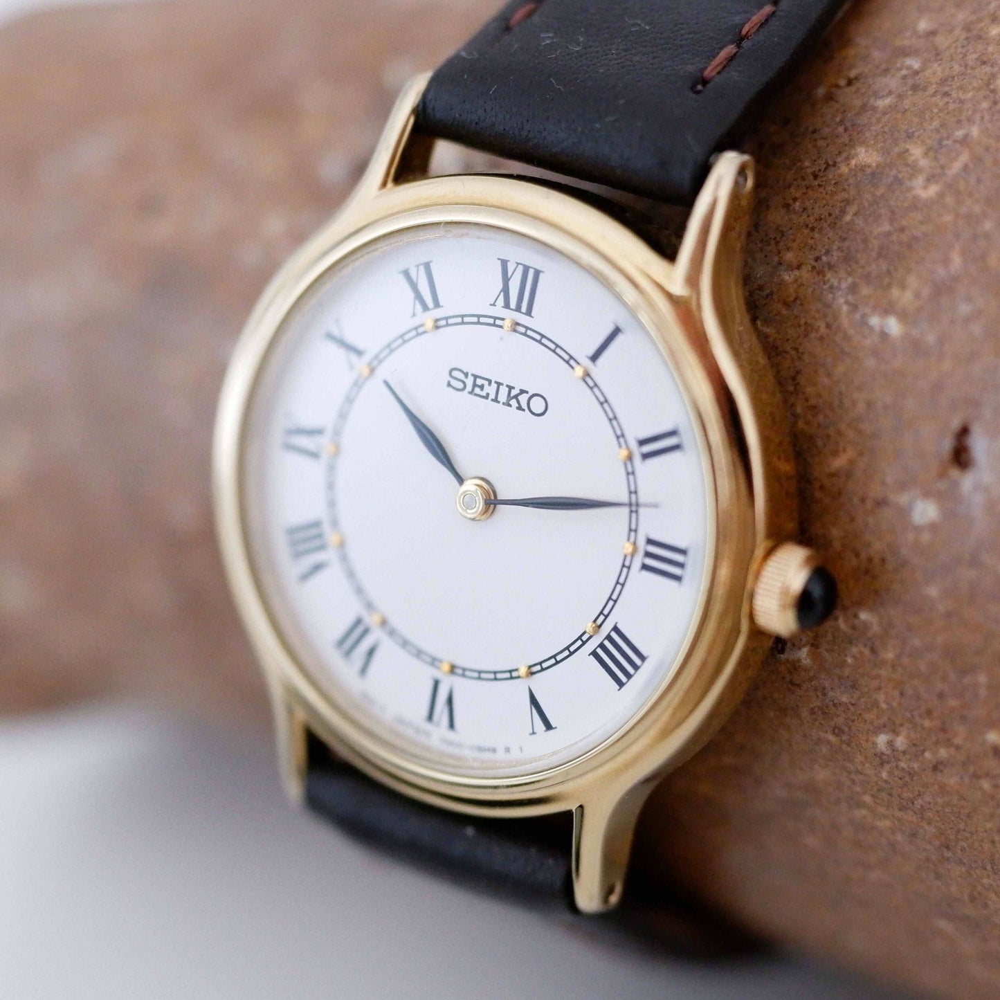 Seiko Vintage Ladies Watch: 90s Gold with Elegant Roman Numerals, Slight Right Side
