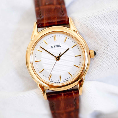 Seiko Dainty Watch: Ladies 80s Golden Classic White Guilloche Dial NOS