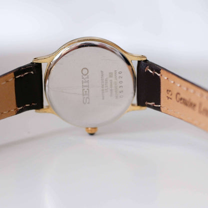 Seiko Vintage Ladies Watch: 90s Gold with Elegant Roman Numerals, Back Side