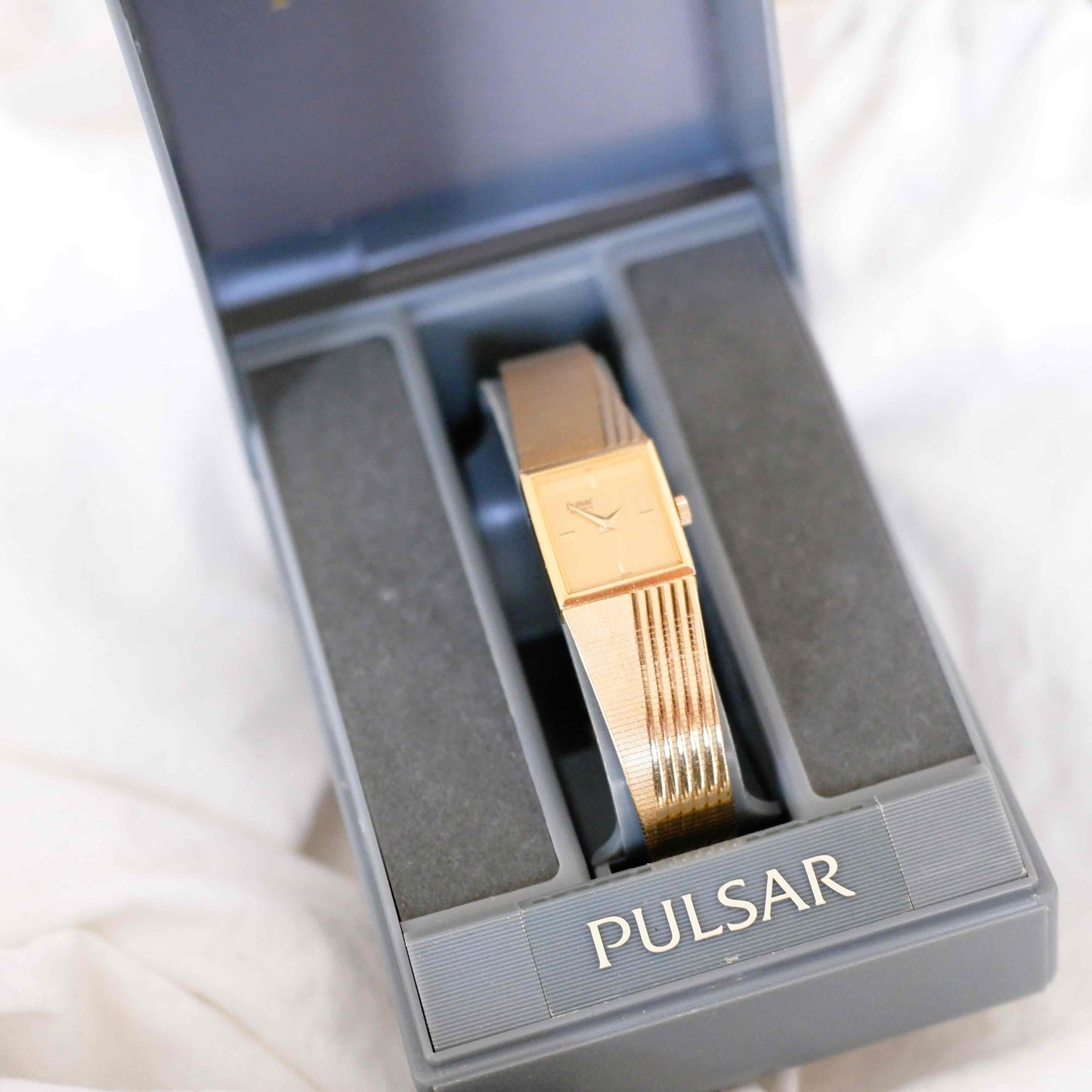 Pulsar Cocktail Watch: Vintage Ladies 80s Golden Dainty with Champagne Dial - NOS