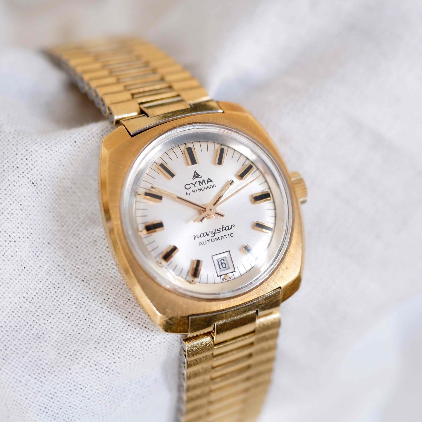 Cyma Vintage Watch: Ladies 60s Golden Sunburst White Dial with Automatic Movement NOS