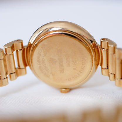 Raymond Weil Cocktail: Vintage Ladies 90s Gold with Elegant Roman Numerals