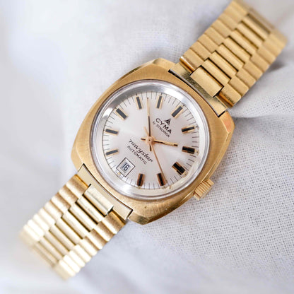 Cyma Vintage Watch: Ladies 60s Golden Sunburst White Dial with Automatic Movement NOS