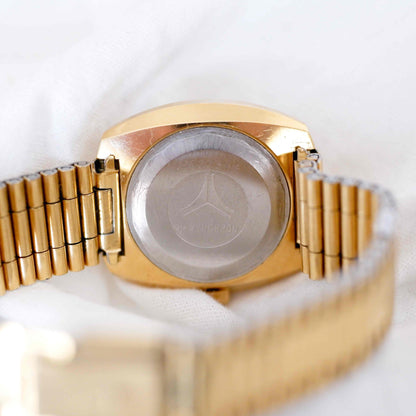 Cyma Vintage Watch: Ladies 60s Golden Sunburst White Dial with Automatic Movement NOS