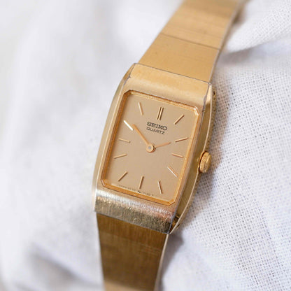 Seiko Cocktail Watch: Vintage 80s Ladies Golden Dainty with Champagne Dial