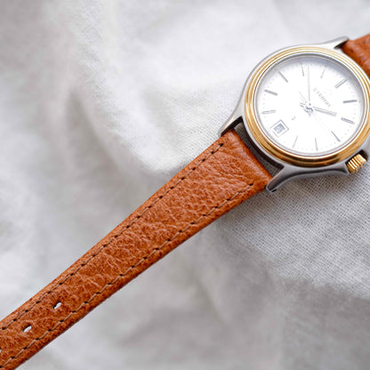 Eterna Vintage Watch: Ladies 80s Gold with White Linen Dial