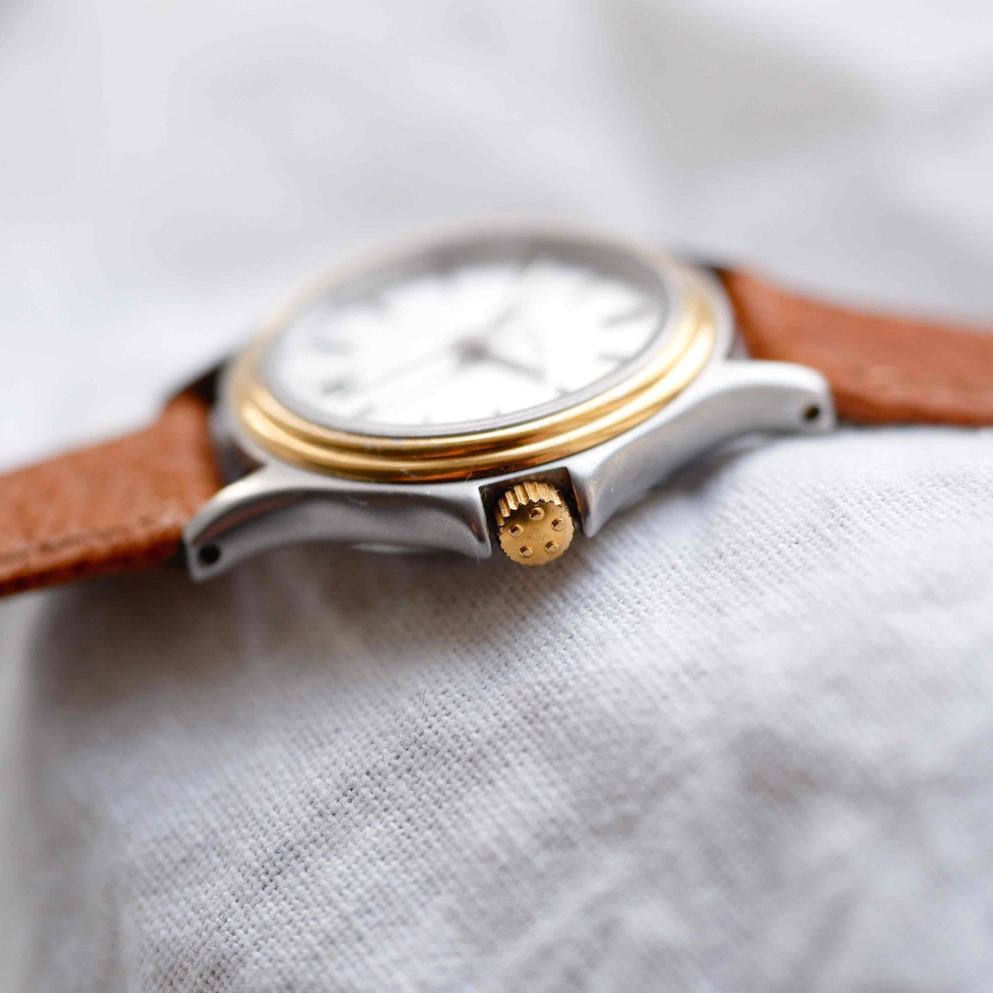Eterna Vintage Watch: Ladies 80s Gold with White Linen Dial