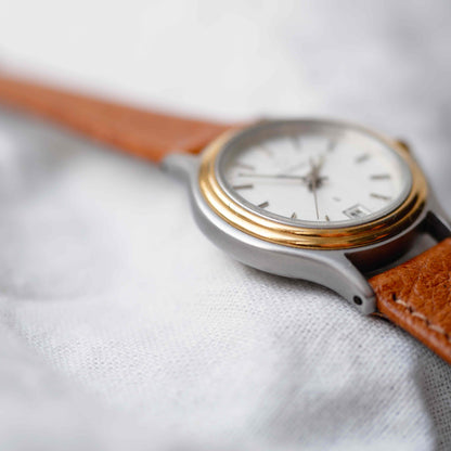 Eterna Vintage Watch: Ladies 80s Gold with White Linen Dial