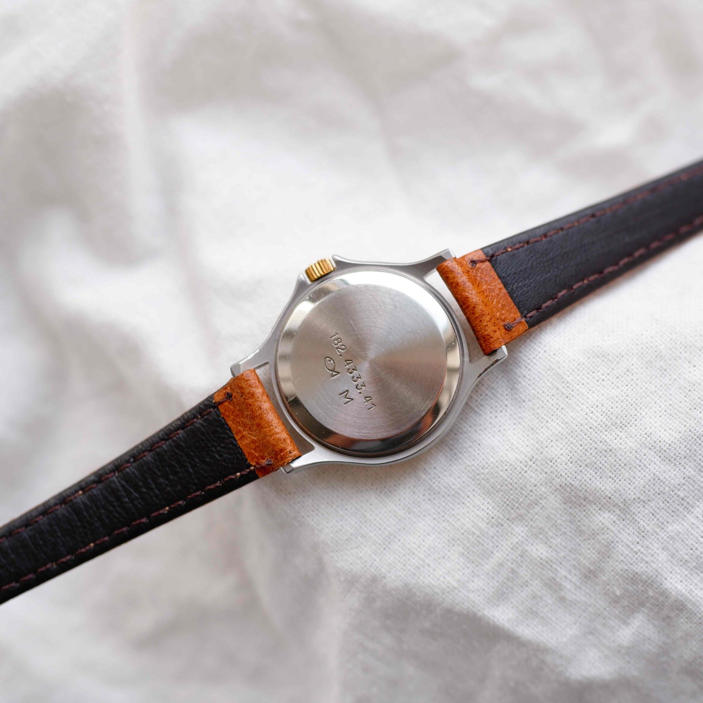 Eterna Vintage Watch: Ladies 80s Gold with White Linen Dial