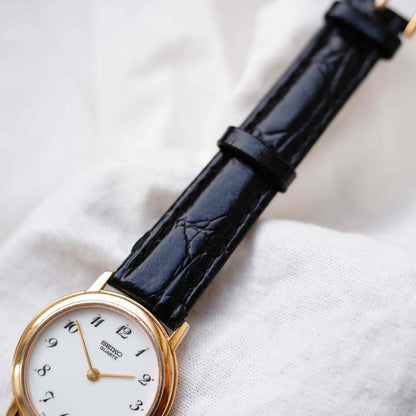 Seiko Vintage Ronde: Ladies Watch 90s Gold White Arabic Dial