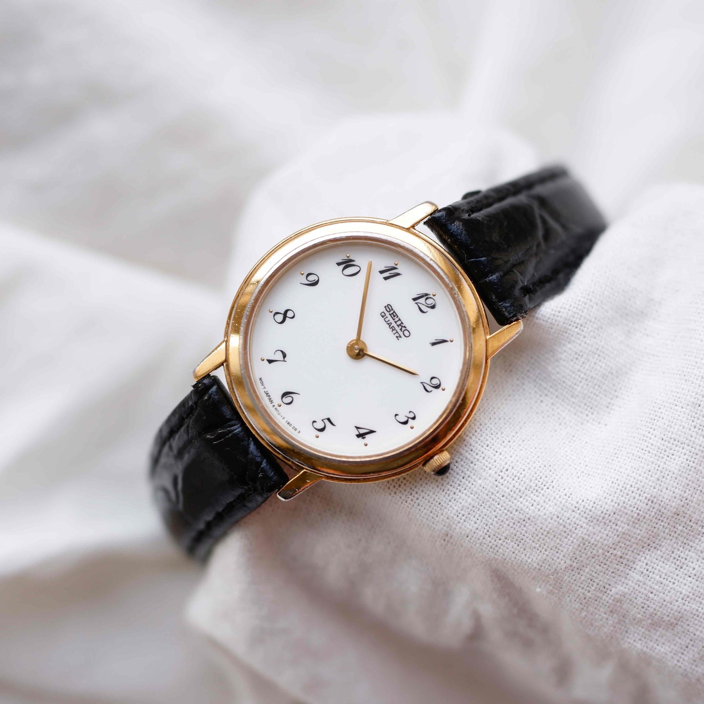 Seiko Vintage Ronde: Ladies Watch 90s Gold White Arabic Dial