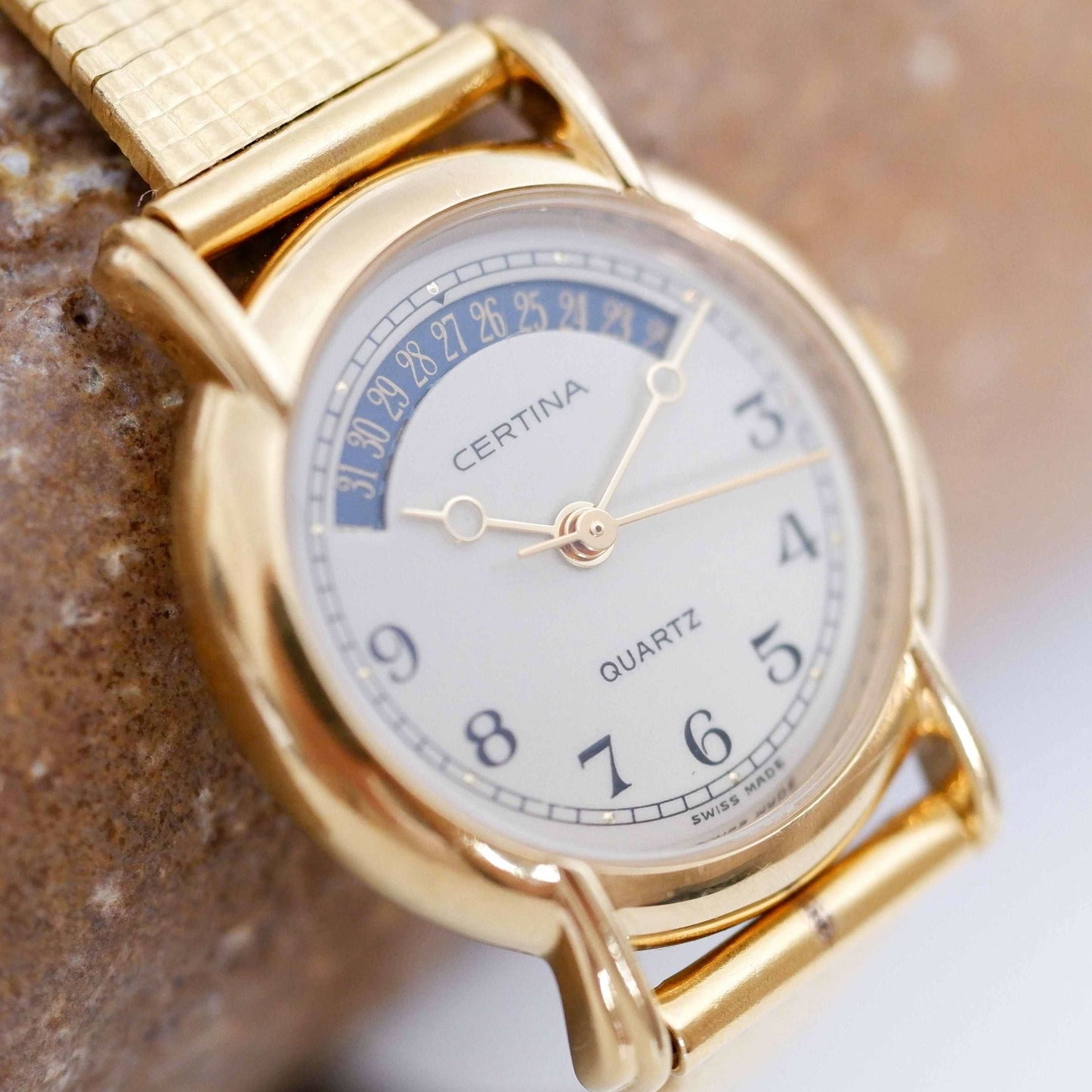 Certina Vintage Ladies Watch: 90s Gold, Blue Date and Classic Numerals, Second Slight Left Side
