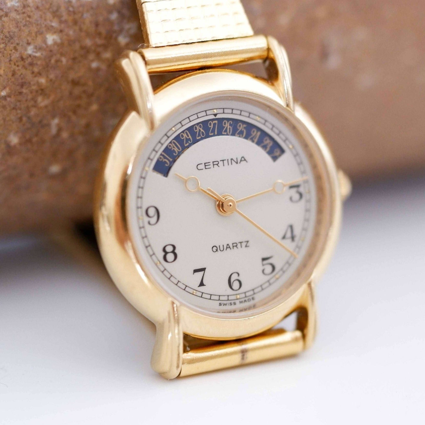 Certina Vintage Ladies Watch: 90s Gold, Blue Date and Classic Numerals, First Slight Left Side