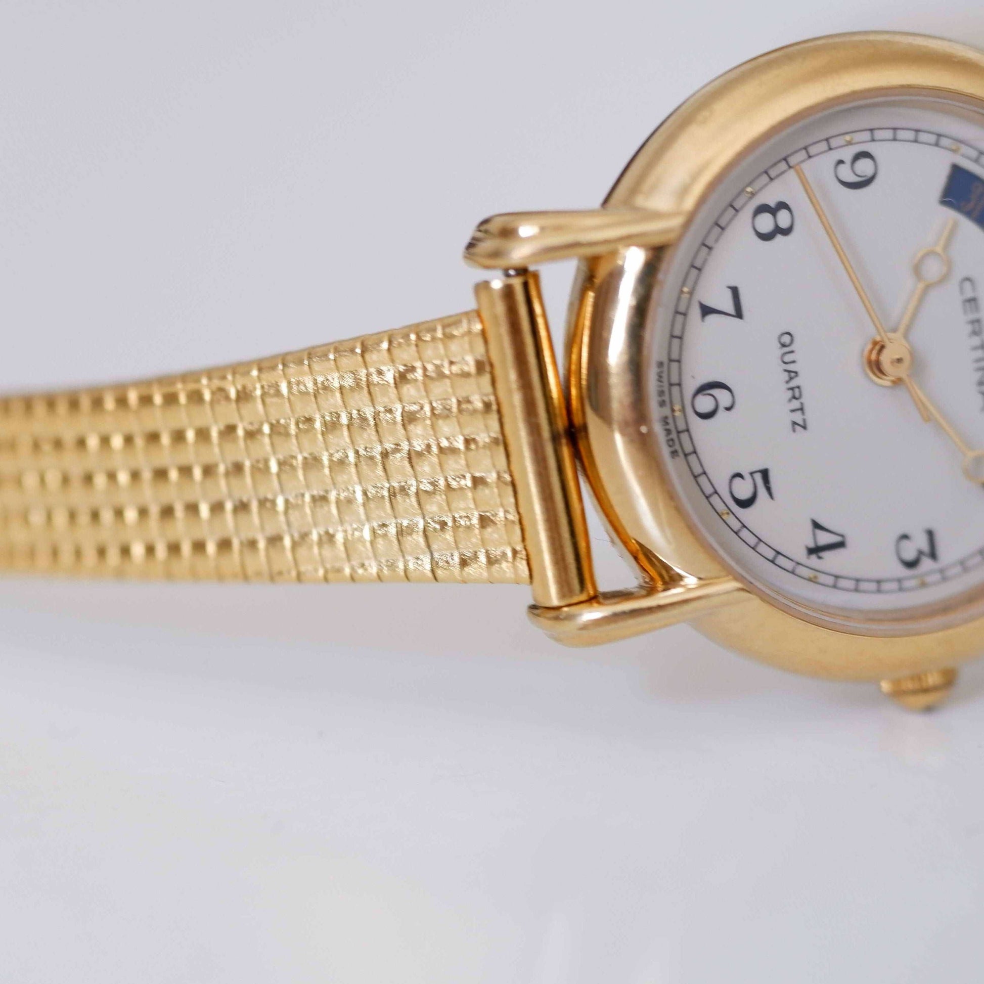Certina Vintage Ladies Watch: 90s Gold, Blue Date and Classic Numerals, Bracelet