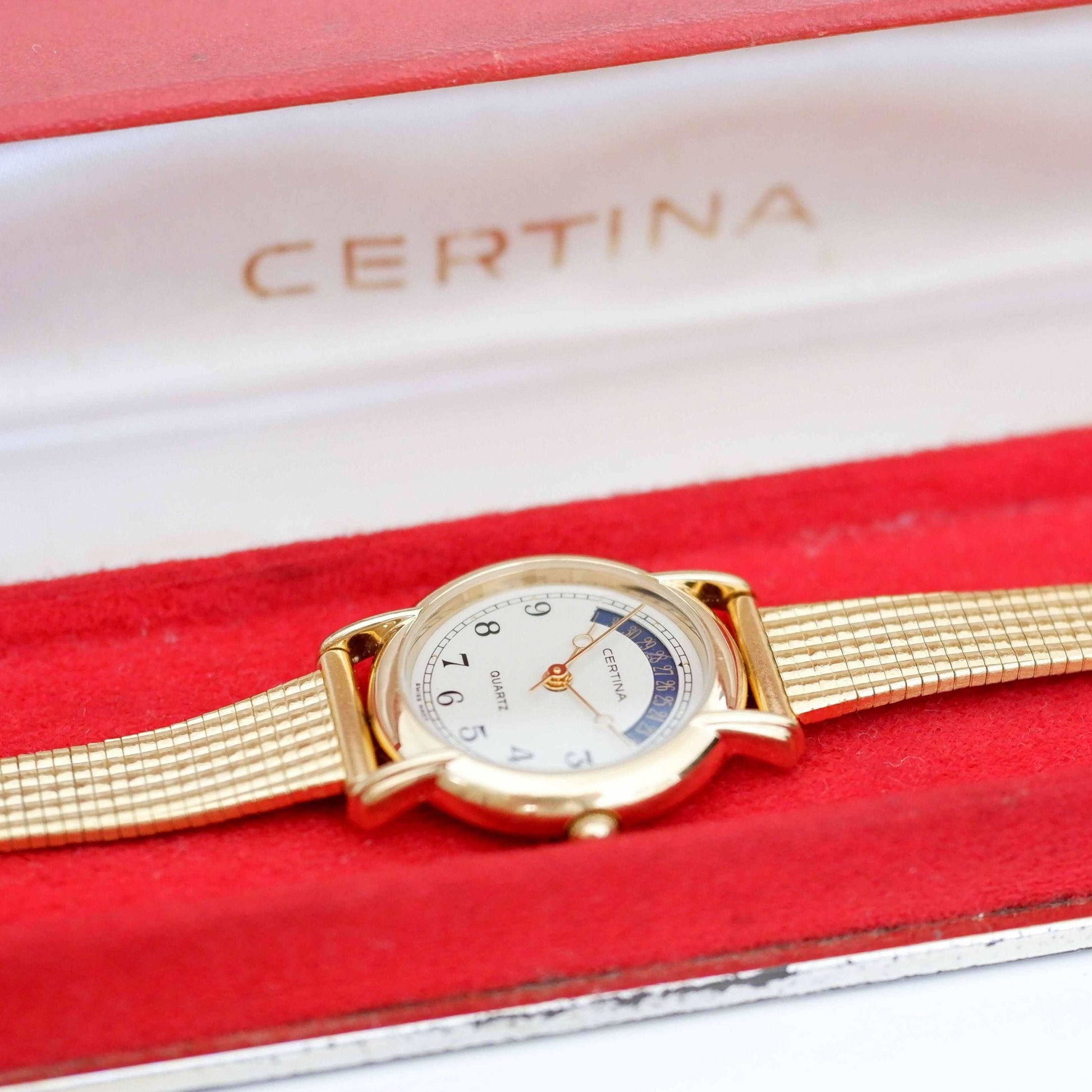 Certina Vintage Ladies Watch: 90s Gold, Blue Date and Classic Numerals, Packaging