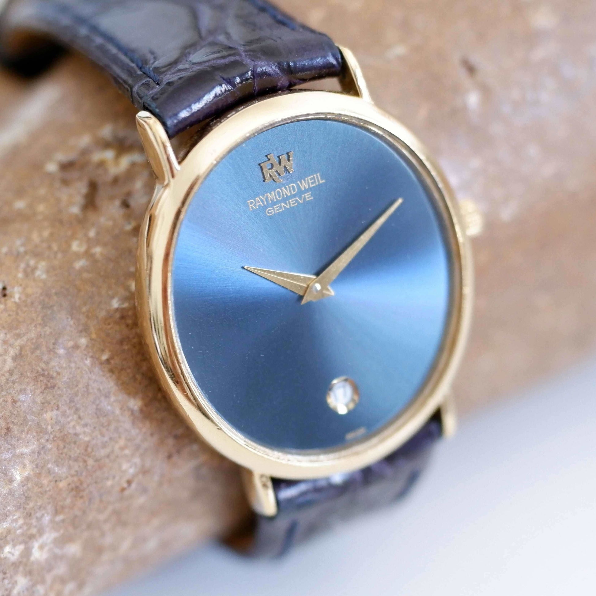 Raymond Weil Vintage Ladies Watch: 90s Golden Oval Style with Blue Sunburst Dial, Second Slight Left Side