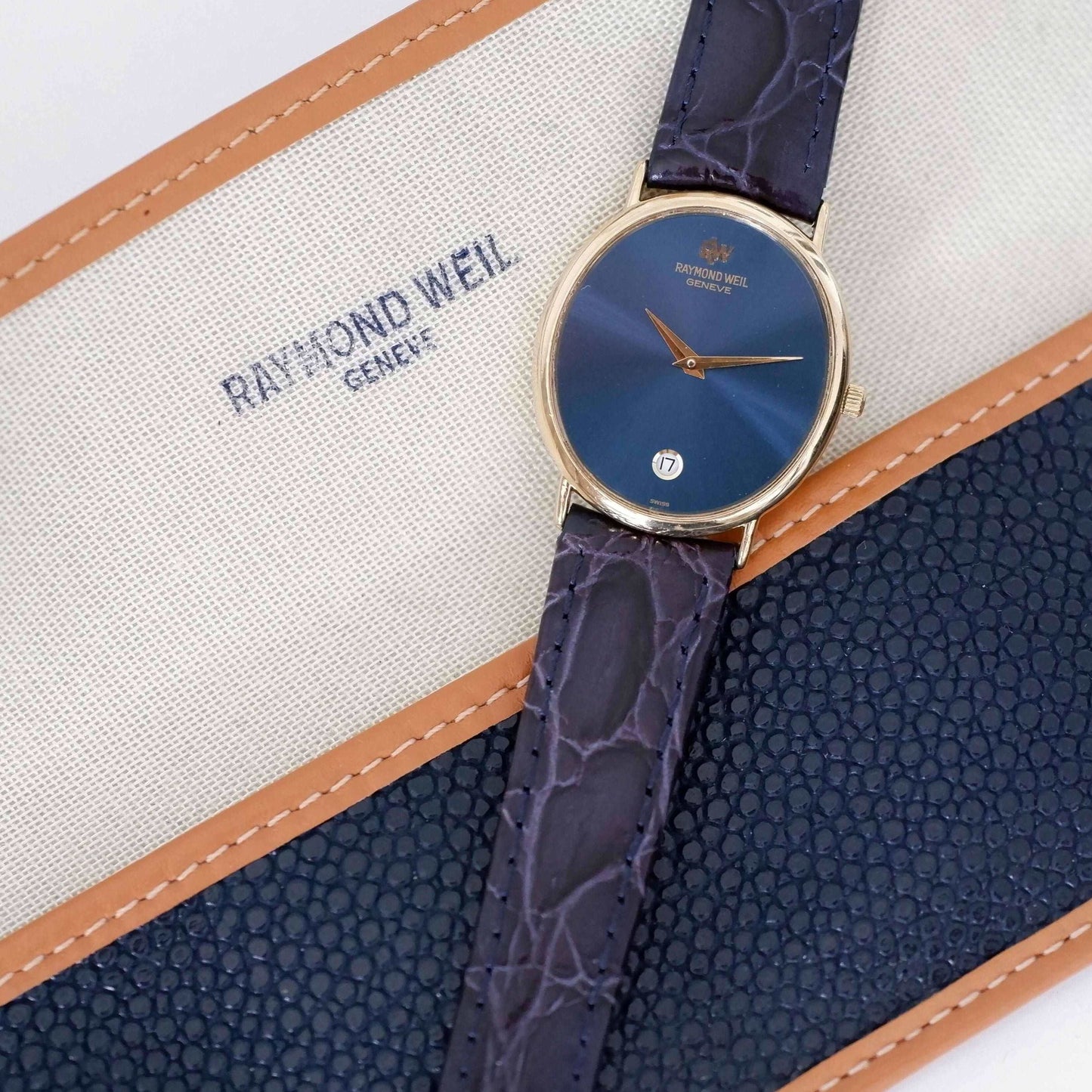 Raymond Weil Vintage Ladies Watch: 90s Golden Oval Style with Blue Sunburst Dial, Packaging
