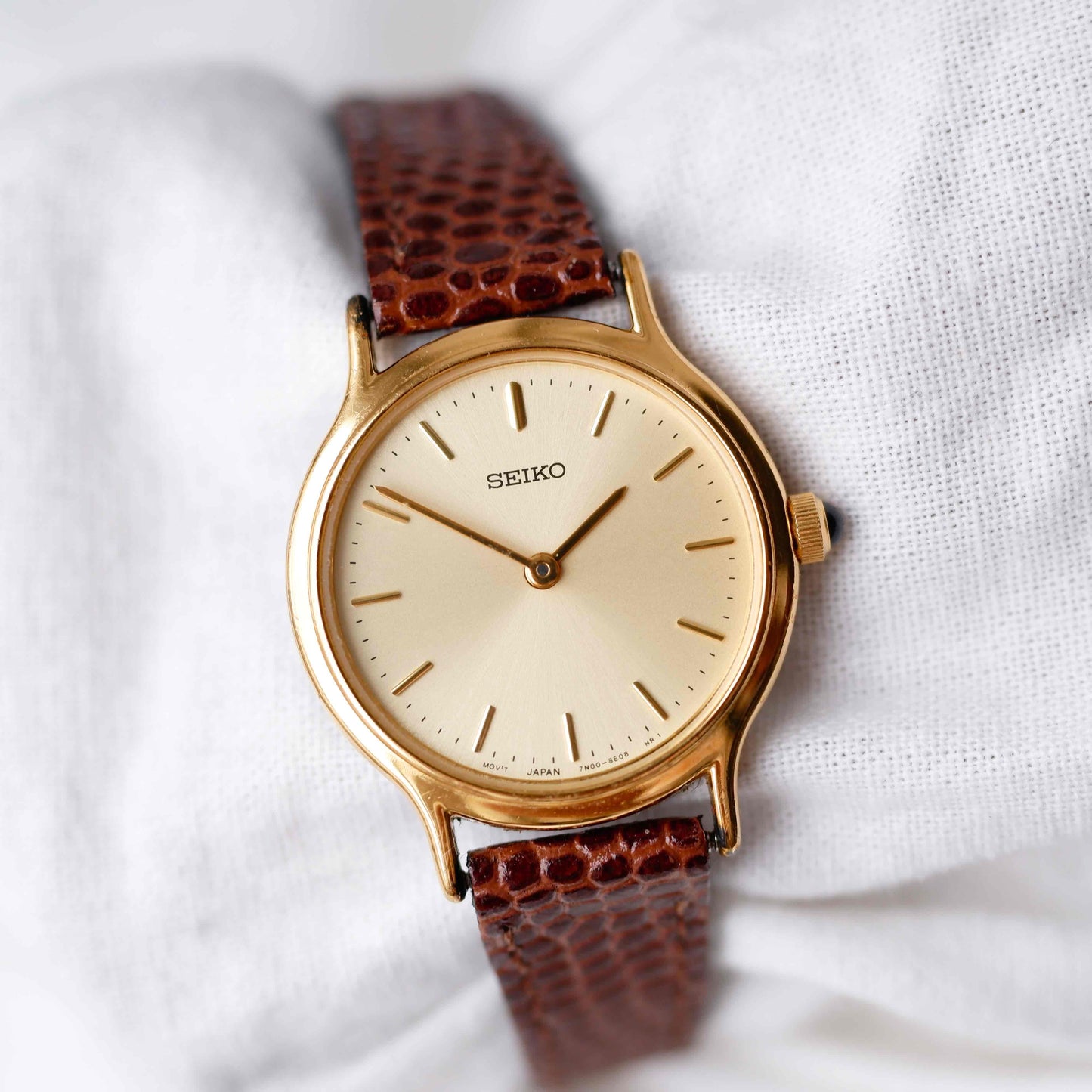 Seiko Vintage Watch: Ladies 80s Gold with Sunburst Champagne Dial