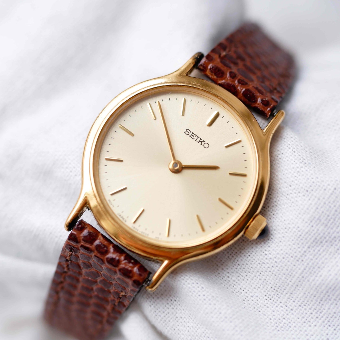 Seiko Vintage Watch: Ladies 80s Gold with Sunburst Champagne Dial