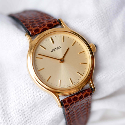 Seiko Vintage Watch: Ladies 80s Gold with Sunburst Champagne Dial
